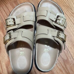 Birkenstock  Sandals in Beige with Gold Buckles